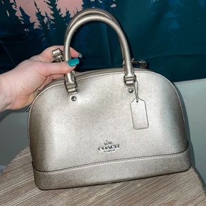 Beautiful light gold coach cross body purse